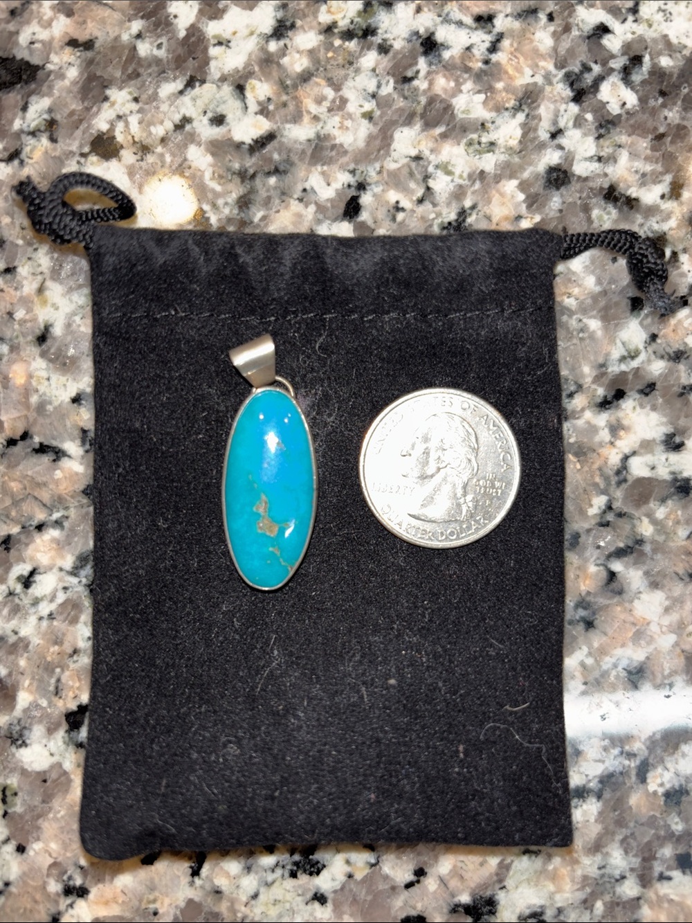 Stamped sterling silver and Turquoise Oval Pendant